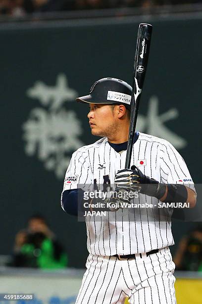 Yoshitomo Tsutsugou bats during the game five of Samurai Japan and MLB All Stars at Sapporo Dome on November 18, 2014 in Sapporo, Hokkaido, Japan.