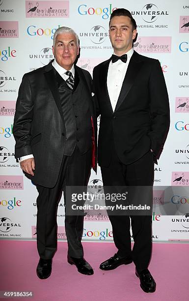 Mitch Winehouse and ex-boyfriend Reg Traviss attends the Amy Winehouse Foundation ball at The Landmark Hotel on November 18, 2014 in London, England.