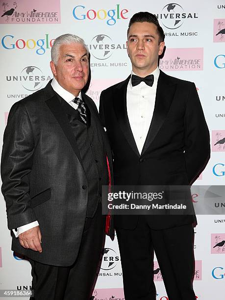 Mitch Winehouse and ex-boyfriend Reg Traviss attends the Amy Winehouse Foundation ball at The Landmark Hotel on November 18, 2014 in London, England.