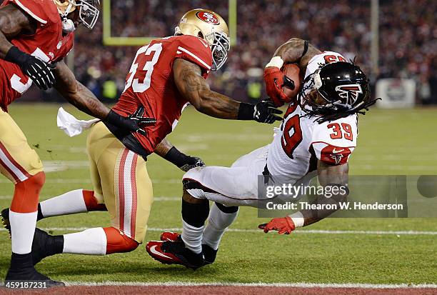 Steven Jackson of the Atlanta Falcons scored a touchdown on a two-yard run, pushed into the endzone by NaVorro Bowman of the San Francisco 49ers...