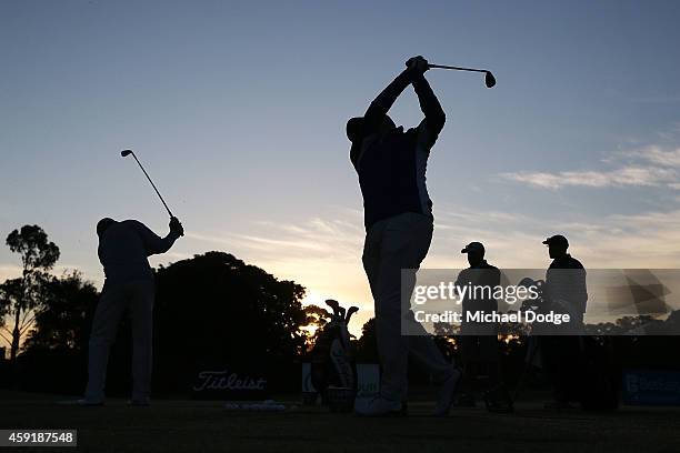 David McKenzie of Australia tees off on the practice fairway ahead of the 2014 Australian Masters at The Metropolitan Golf Course on November 19,...