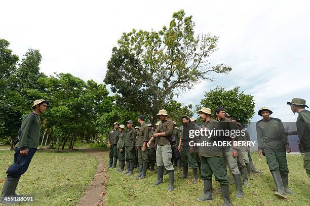 Indonesia-environment-animal-rhino,FEATURE by Arlina Arshad This picture taken on November 16, 2013 shows Indonesian rangers from the Rhino...