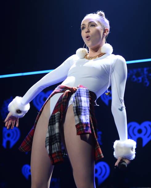Miley Cyrus performs at the Y 100 Jingle Ball - Show at BB&T Center on December 20, 2013 in Sunrise, Florida.