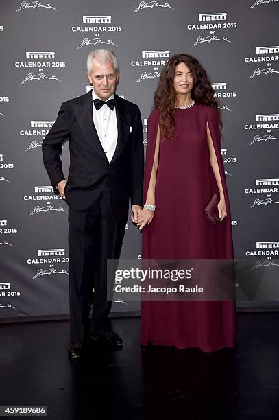 Marco Tronchetti Provera and Afef Jnifen attend the 2015 Pirelli Calendar Red Carpet on November 18, 2014 in Milan, Italy.