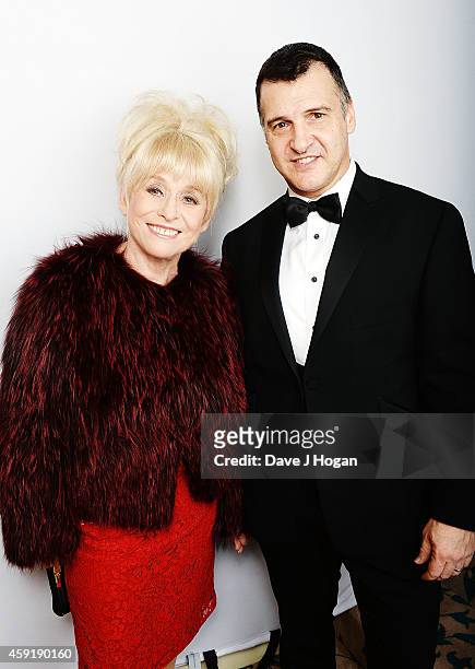 Barbara Windsor and Scott Mitchell attend the Amy Winehouse Foundation ball at The Landmark Hotel on November 18, 2014 in London, England.
