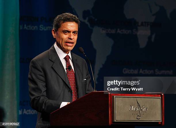 Journalist Fareed Zakaria speaks at the 2014 Global Action Summit at Music City Center on November 18, 2014 in Nashville, Tennessee.