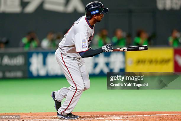 Eduardo Nunez of the Minnesota Twins hits an RBI single in the sixth inning during the game against the Samurai Japan at the Sapporo Dome during the...