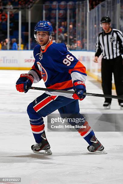 Pierre-Marc Bouchard of the New York Islanders skates against the Detroit Red Wings at Nassau Veterans Memorial Coliseum on November 29, 2013 in...