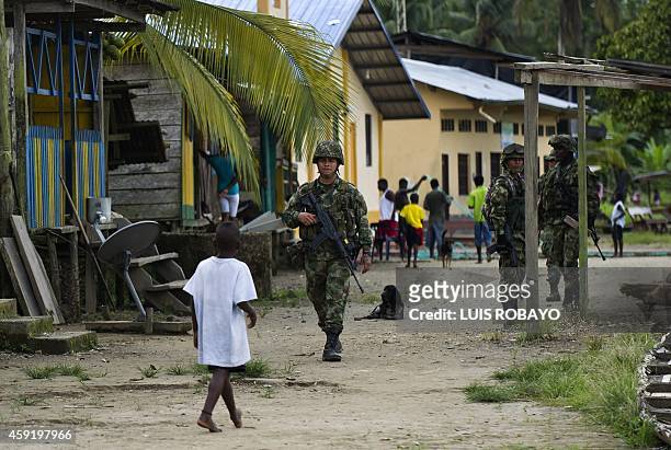 Colombian soldiers patrol the streets of Las Mercedes, rural area of Quibdo, Department of Choco, Colombia, on November 18 where Colombian General...