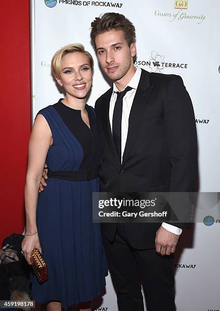 Scarlett Johansson and her brother Hunter Johansson attend the 2nd Annual Champions Of Rockaway Hurricane Sandy Benefit at Hudson Terrace on November...