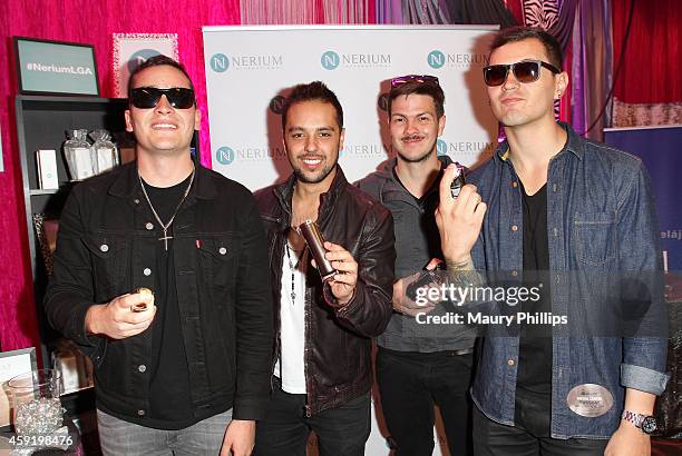 Musicians Diego Pulecio, Jaime Medina, Carlos Leongomez and Jaime Valderrama of Don Tetto attend the gift lounge during the 15th annual Latin GRAMMY...