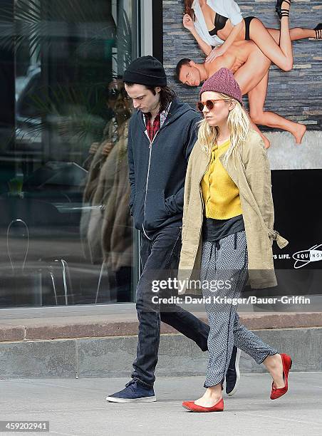 Sienna Miller and Tom Sturridge are seen on March 28, 2013 in New York City.