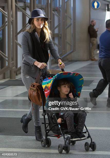 Jessica Alba is seen at Los Angeles International Airport with her daughter, Honor Warren on February 28, 2013 in Los Angeles, California.