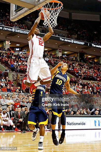 Sam Thompson of the Ohio State Buckeyes dunks the ball during the second half of the game against the Marquette Golden Eagles at Value City Arena on...