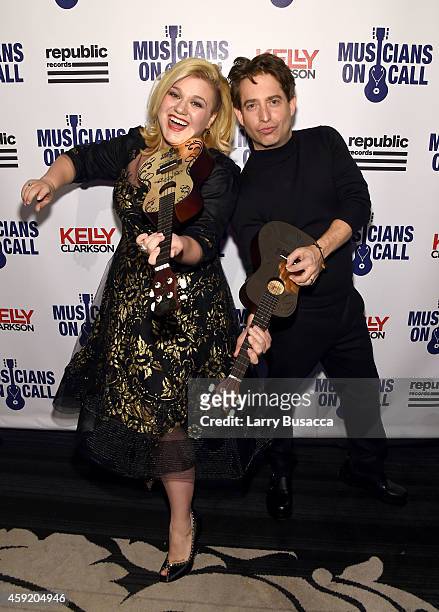 Kelly Clarkson and Executive Vice President Of Republic Records, Charlie Walk attend Musicians On Call Celebrates Its 15th Anniversary Honoring Kelly...