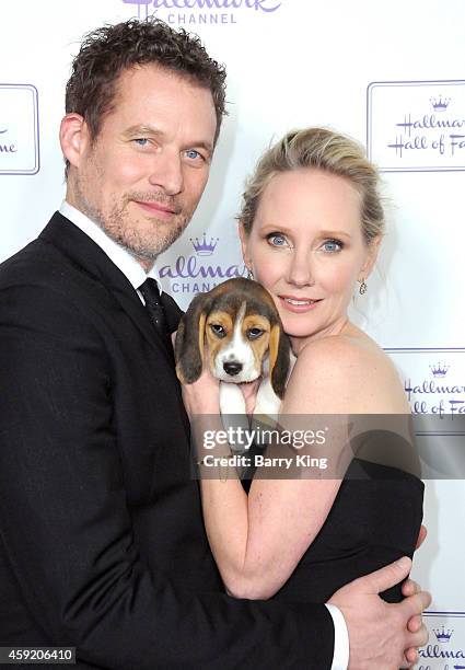 Actress Anne Heche and James Tupper arrive at the Hallmark Hall Of Fame 'One Christmas Eve' Los Angeles premiere at Fig & Olive Melrose Place on...