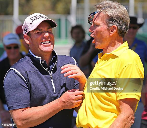 Channel Nine Footy Show co-host Sam Newman jokes around with former Australian Test cricketer Shane Warne during the Pro-Am ahead of the 2014...