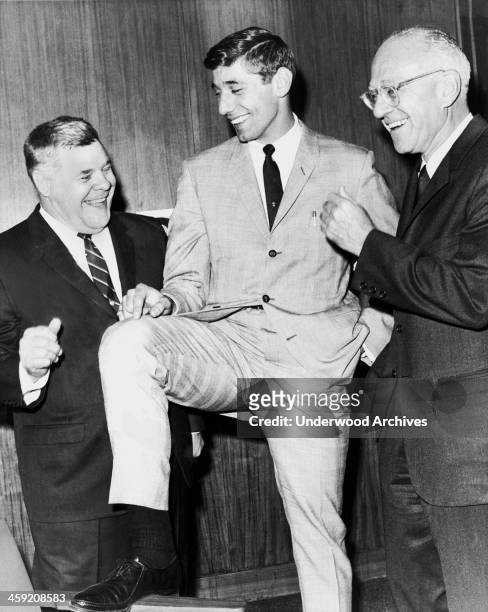 First round draft pick quarterback Joe Namath with New York Jets coach Weeb Ewbank and Jets owner Sonny Werblin, , New York, New York, 1965.