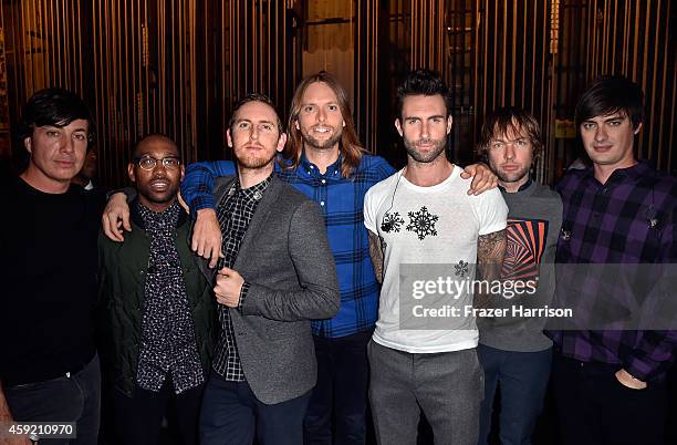 Musicians Matt Flynn, PJ Morton, Jesse Carmichael, James Valentine, Adam Levine, Mickey Madden, and Sam Farrar of Maroon 5 backstage during A VERY...