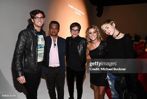 Director Andrew Jenks, Sarang Bhakre, Global Executive Director of the MAC AIDS Fund Nancy Mahon, Paige Rawl and singer Miley Cyrus attends MAC...