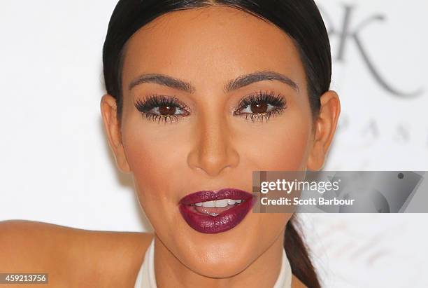 Kim Kardashian smiles as she promotes her new fragrance "Fleur Fatale" at Chadstone Shopping Centre on November 19, 2014 in Melbourne, Australia.