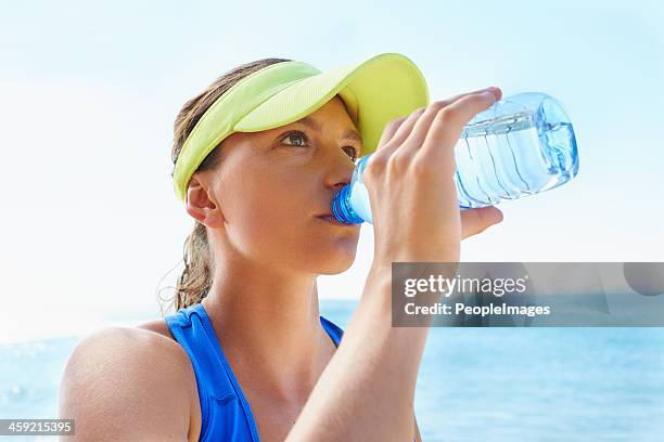 hydration is key - heat exhaustion stock pictures, royalty-free photos & images