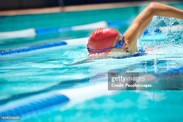 taking charge of the race - swimming free style pool stock pictures, royalty-free photos & images