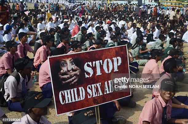 Indian school students participate in an awareness Campaign against Child Sex Abuse in Hyderabad on November 19 the World Day for Prevention of Child...