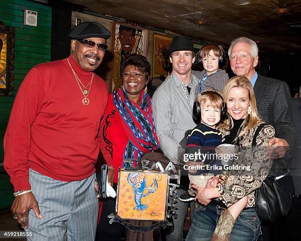 Emile Jackson, Irma Thomas, Saints quarterback Drew Brees, Bowen Brees, Dr. Daniel Price, Brittany Brees and Baylen Brees pause for a photo during...