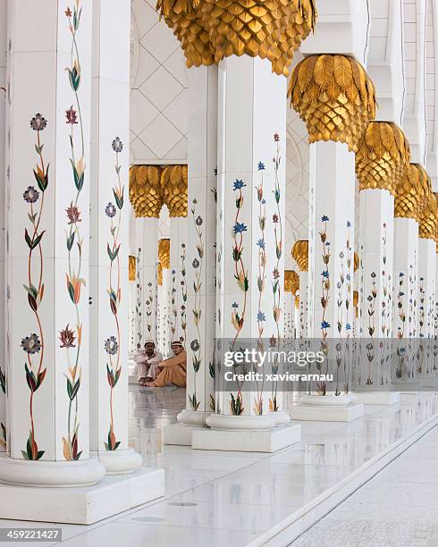 relax in the sheikh zayed grand mosque - sheikh zayed grand mosque stock pictures, royalty-free photos & images