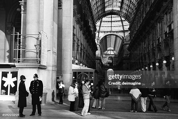 policemen in center of milan - galleria vittorio emanuele ii stock pictures, royalty-free photos & images