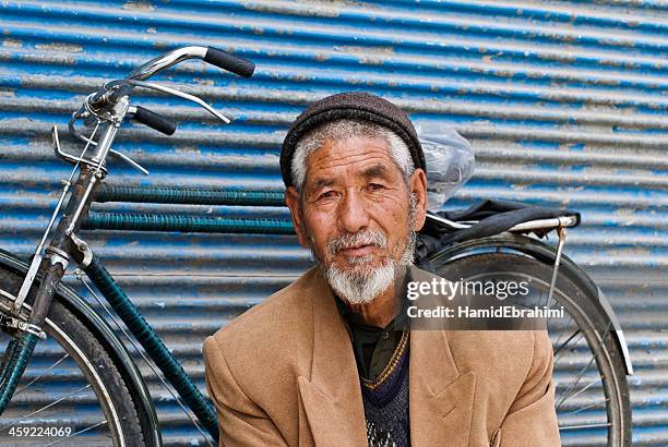 refugee - afghan old man stock pictures, royalty-free photos & images