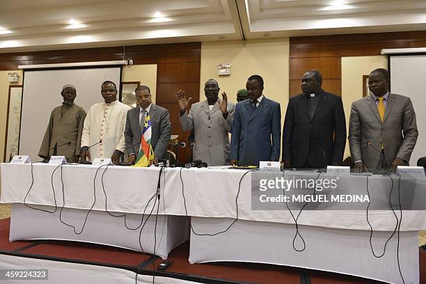Central Africa's interim leader Michel Djotodia , Prime Minister Nicolas Tiangaye , President of the Transitional Council Alexandre Nguendet and...