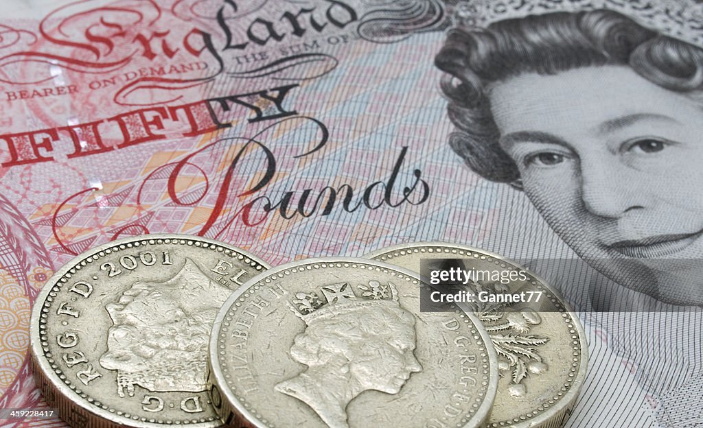 Fifty Pound note and coins
