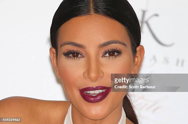 Kim Kardashian smiles as she promotes her new fragrance "Fleur Fatale" at Chadstone Shopping Centre on November 19, 2014 in Melbourne, Australia.