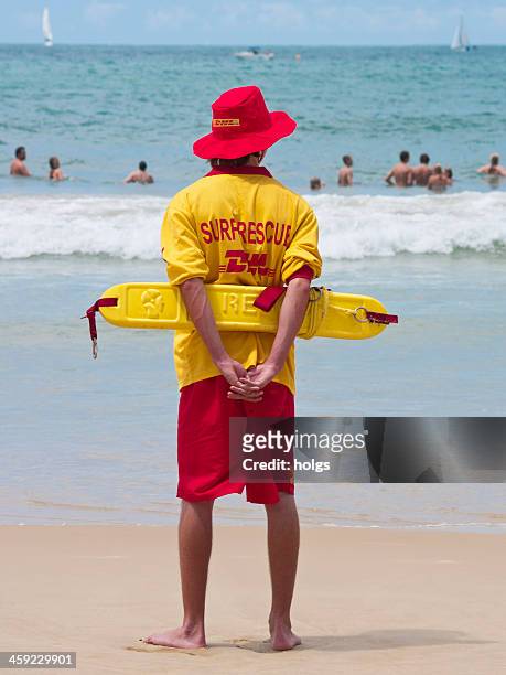 lifesaver patrols moloolaba beach, queensland, australia - beach lifeguard stock pictures, royalty-free photos & images