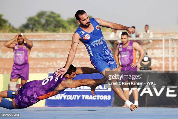 Vancouver Lions compete against United Singhs during the 2014 World Kabaddi league tournament at Punjab Agricultural University Hockey Stadium on...