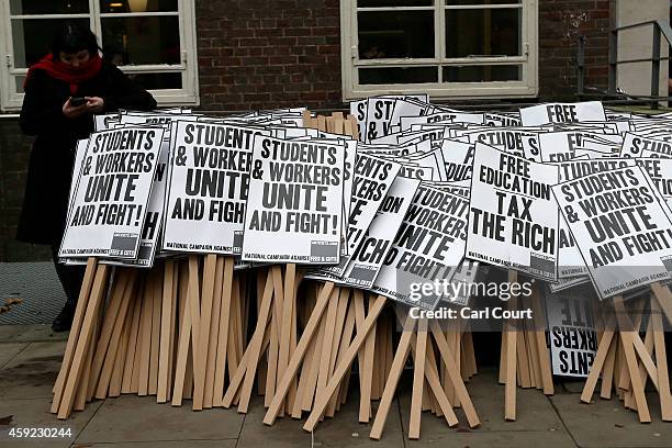 Protest placards are assembled during in a protest against fees and cuts in the education system on November 19, 2014 in London, England. A coalition...