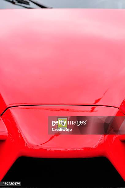 ferrari enzo supercar front detail with the yellow ferrari badge - air intake shaft stock pictures, royalty-free photos & images