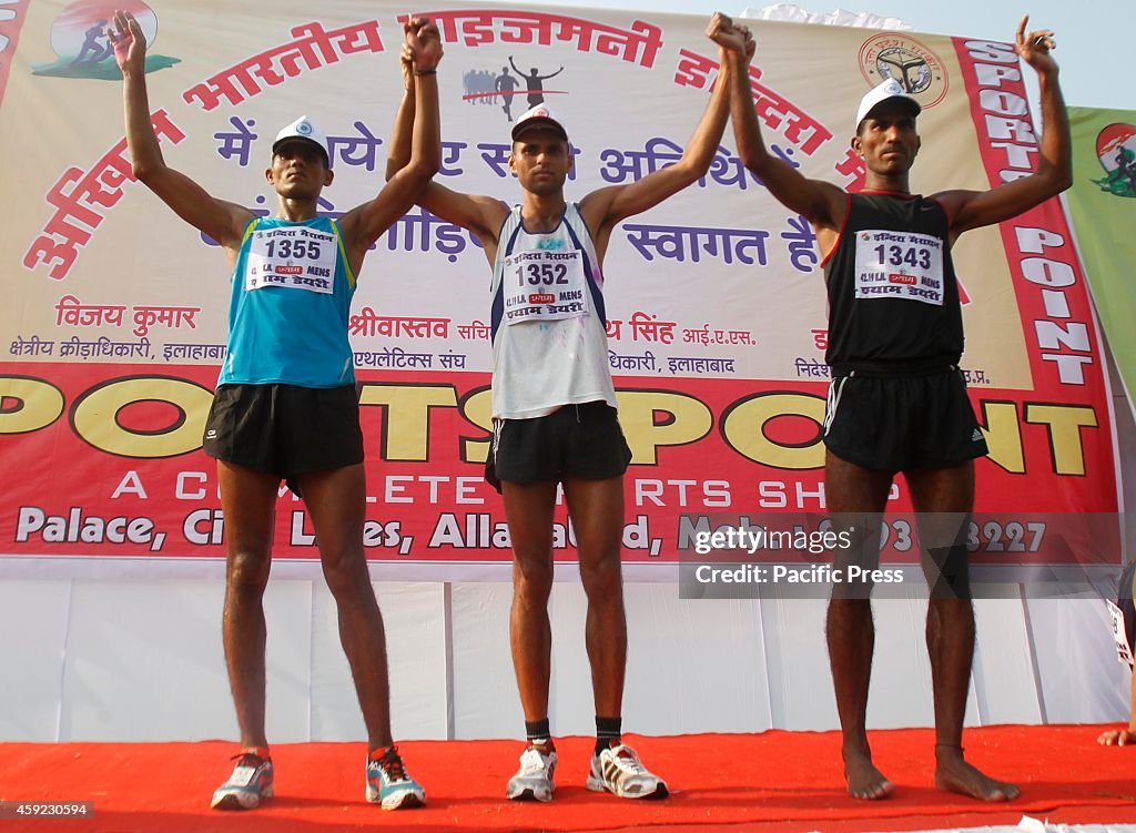 30th Indira marathon men winners showing victory on the...