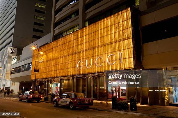 gucci flagship store - gucci flagship stock pictures, royalty-free photos & images