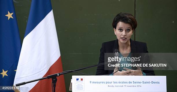 French Education Minister Najat Vallaud-Belkacem delivers a speech on November 19, 2014 during a visit at the Jean-Rostand school in Bondy. AFP PHOTO...