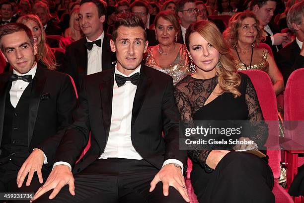 Philipp Lahm, Miroslav Klose and his wife Sylwia arrive at the Bambi Awards 2014 on November 13, 2014 in Berlin, Germany.