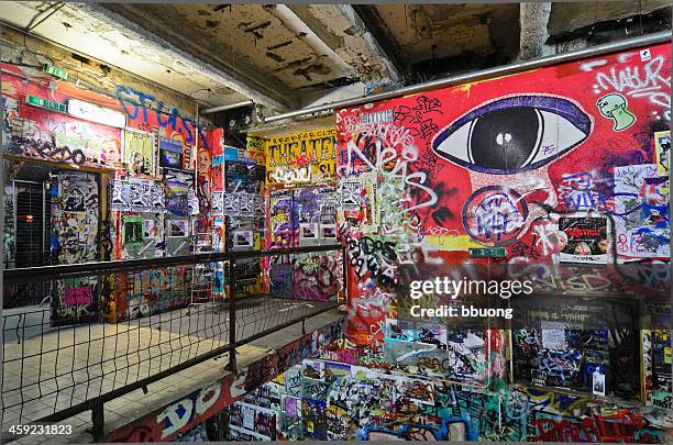 the eye in kunsthaus tacheles (berlin) - berlin graffiti stock pictures, royalty-free photos & images