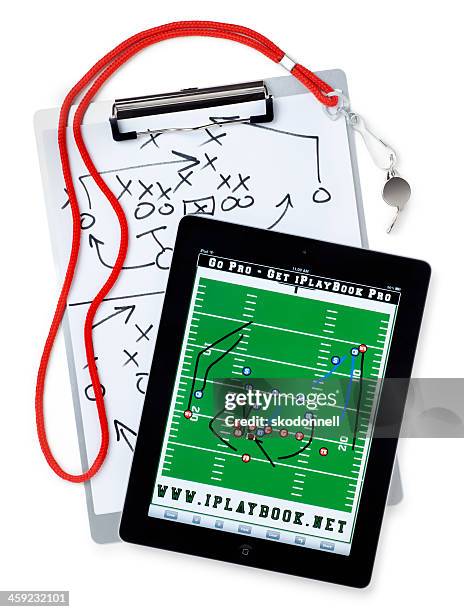 apple ipad ii with football playbook on white - coach playbook stock pictures, royalty-free photos & images