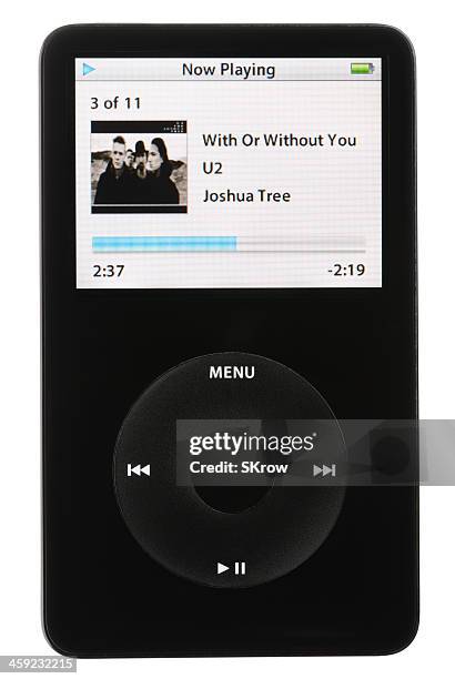 reproducción de música para ipod - ipod fotografías e imágenes de stock