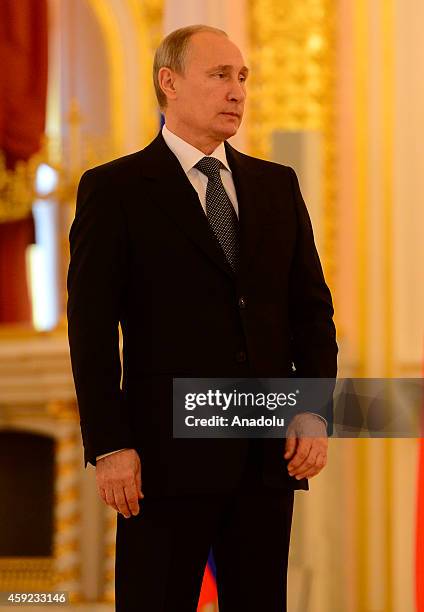 Russian President Vladimir Putin attends a credential presentation ceremony of new foreign ambassadors in the Alexander Hall of the Grand Kremlin...