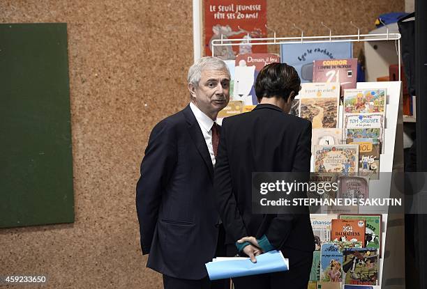 French Education Minister Nadjat Vallaud-Belkacem speaks with French National Assembly president Claude Bartolone during a visit of the Jean-Rostand...