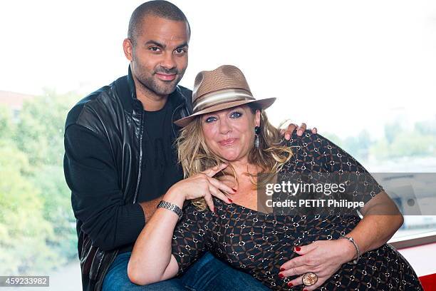 Tony Parker with his mother Pamela Firestone at the Parc des Prince on september 17, 2014 in Paris, France.