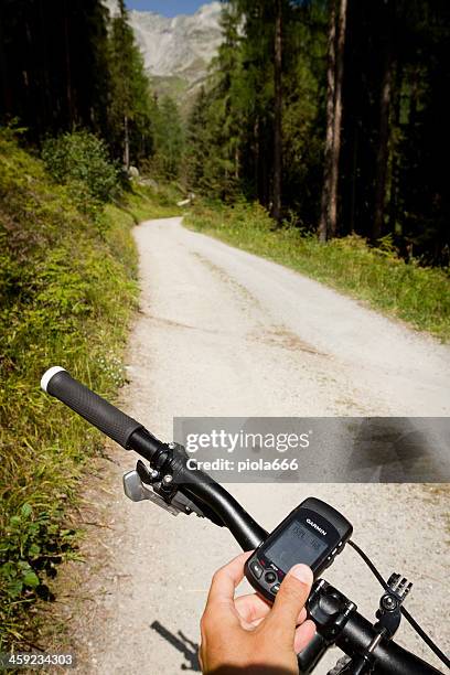 mountain bike gps outdoor orientering - garmin-global-positioning-system stock pictures, royalty-free photos & images